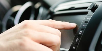 man-using-gps-navigation-system-in-car-to-travel-GMA5VS4.jpg